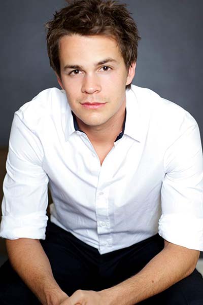 Johnny Simmons poses for a picture.